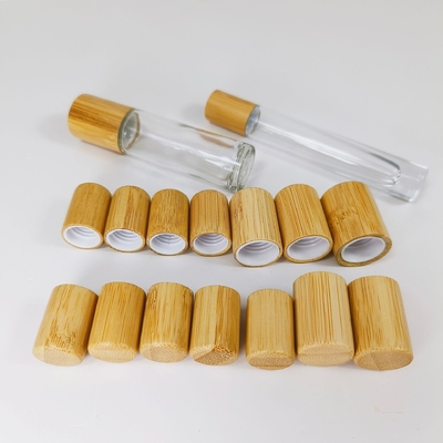 5ml 10ml Essential Oil Bottle With Stainless Steel Roller Ball Bamboo Top Eye Cream Roll On Glass Bottle With Bamboo Cap