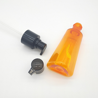Amber PET/PETG Plastic Triangle Bottle with Black Lotion Pump - 3.5 oz