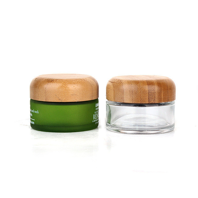 Cream bottle with bamboo lid, cosmetic packaging material, round thick transparent glass cream bottle, 50g container