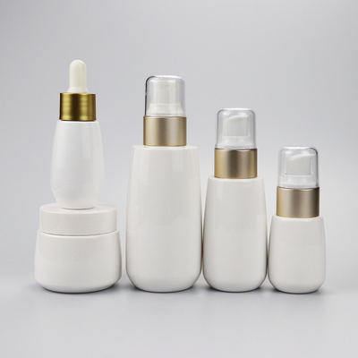 Cosmetic luxury gold pump cap pet plastic skincare products packaging bottle set dropper /spray /cream /lotion bottle